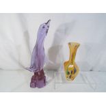 A large good quality glass model depicting a penguin, signed to the base,