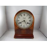 A Comitti of London Durr Ye veneered mantle clock key and original label Est £50 - £70.