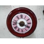 A wall clock with porcelain dial,