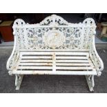 A cast iron garden bench,