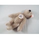 A Steiff miniature teddy bear 2005.