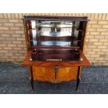 Good quality drinks cabinet with mirrored interior and inlaid floral decoration,