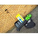 A 'The Handy' garden leaf blower / vacuum, snow shovel and similar.