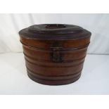 A vintage hat box with leather effect, lock marked Machine Made Lever with Modern Improvements,