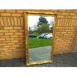 A good quality bevel edged mirror in a gilded frame,