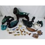 A good mixed lot of animal figurines by Blue Mountain and similar also include in the lot is a