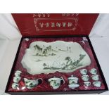 A Japanese Gongfu hand painted ceramic tea set bearing character marks,