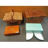 A Fortnum and Masons picnic hamper a further wicker hamper and a Fortnum and Mason storage box and