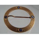 A 14 ct gold circular brooch stone set stamped 14, approximate weight 3.66 g, Est £50 - £80.