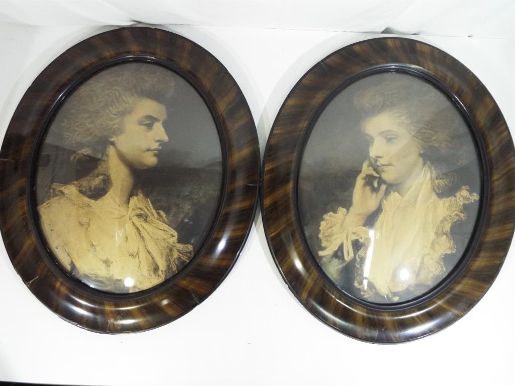 A pair of Christoleums mounted in oval frames,