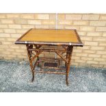 A bamboo occasional table approx 72cm x 67cm x 47cm