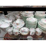 Minton - approximately 115 pieces of Minton tea and dinner ware in a Haddon HAll pattern,