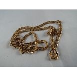 A lady's 9ct gold diamond cut curb chain, approx weight 11.