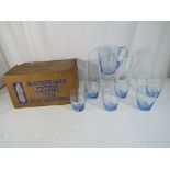 Whitefriars - a water jug set, comprising jug and six glasses in blue, contained in original box,