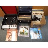 A Garrard turntable and a quantity of 33 rpm vinyl records to include ABBA, Tom Johnes,