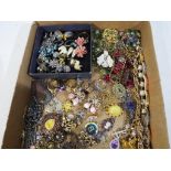 A good collection of costume jewellery to include brooches, necklaces, bracelets,