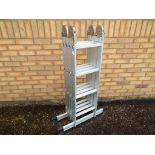 A set of multi folding ladders, folding to 4 ft, extending to approximately 4 m 40 cm.