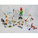 A good mixed lot of predominantly glass animals to include fish, deer,
