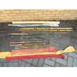 A quantity of fishing equipment to include umbrella, rods, comprising Milbrow spinwell,