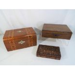Three small storage chests/boxes, two with inlaid decoration,