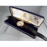 Omega - a gentleman's 9 carat gold cased wristwatch,