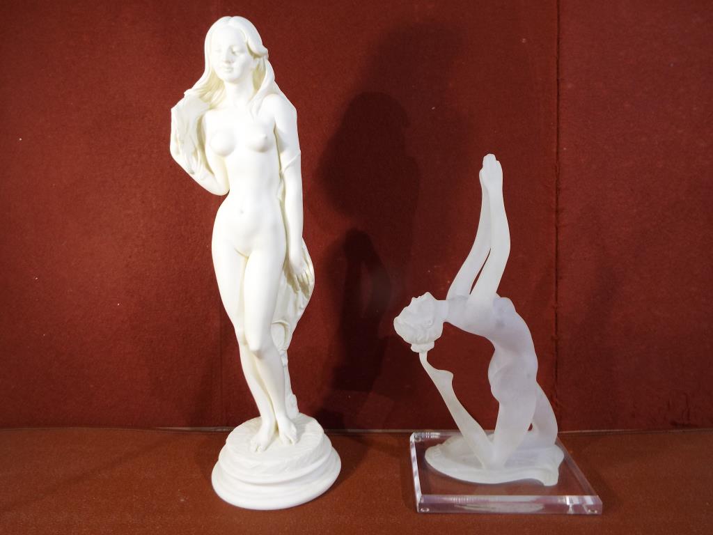 An Art Deco style figurine on perspex base marked W Anina approximately 31 cm [h] and a further