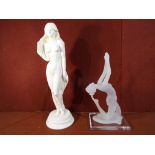 An Art Deco style figurine on perspex base marked W Anina approximately 31 cm [h] and a further