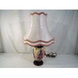Moorcroft Pottery - a Moorcroft Pottery table lamp and shade, decorated in the foxglove pattern,