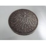 A silver German coin,