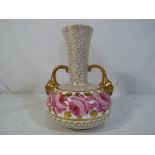 Royal Crown Derby - a Royal Crown Derby ceramic vase, bulbous body and elongated neck,