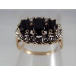 A hallmarked 9 carat gold cluster ring size N, approximate weight 2.39 grams.