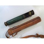 A brass two draw telescope marked Comet M/C 20X Endeeco London,