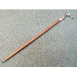A walking stick with a handle in the form of a Jaguar