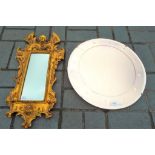 Two mirrors comprising a circular bevel edged mirror approximately 46 cm (d) and a gilt framed