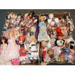 A lot to include two boxes of international costume dolls [2].
