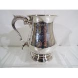 A George VI silver hallmarked tankard London assay 1942,