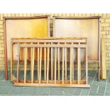 A large good quality vintage mahogany child's cot, dismantled, appear complete.