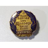 A vintage 9 carat gold and enamelled lapel badge for 10 years service with Kleeneze,