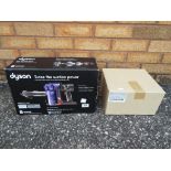 Dyson - a Dyson Animal DC34 vacuum cleaner in original box with a box of Dyson accessories.