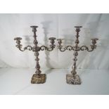 A pair of large silver plated three branch candelabra, approximately 45 cm [h] [2]. Est £20 - £40.