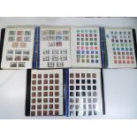 Philately - three binders containing a quantity of UK stamps, Victorian and later.