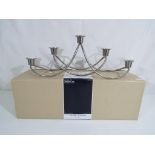 A Georg Jansen Harmony candle holder, contained in original box,