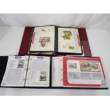 Philately - a lot to include three collections of original albums of First Day Covers and Stamp