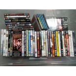 A collection of approximately 40 DVDs and a special editions Multipack plus a small quantity of