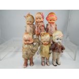 A set of six Japanese bisque miniature dolls approximately 10 cm (h) [6].