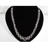 A graduated faceted rock crystal and silver necklace, approx length 51 cm,