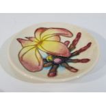 Moorcroft - a modern Moorcroft pottery pin dish with floral decoration, impressed marks to the base,