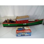 A scratch built steam powered pond boat, using a Wilesco Marine Steam engine,