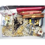 A good mixed lot of predominantly vintage costume jewellery to include paired earrings, necklaces,