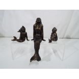 A cast iron bronze finished Mermaid family Est £20 - £30.